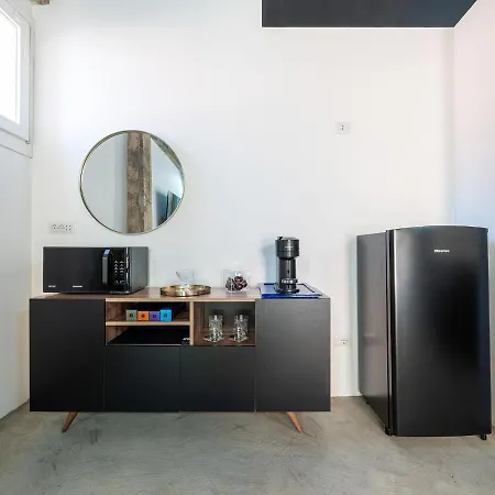 Ex Magazzini בית הארחה